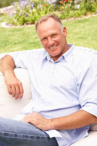 man smiling after getting dental care at Stein Dental Care