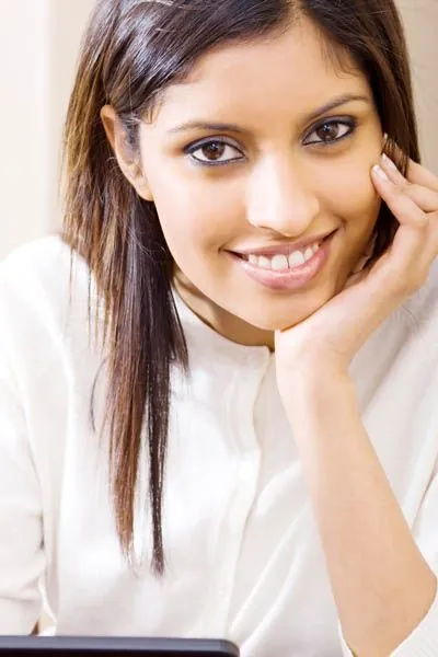woman smiling after her visit to Stein Dental Care